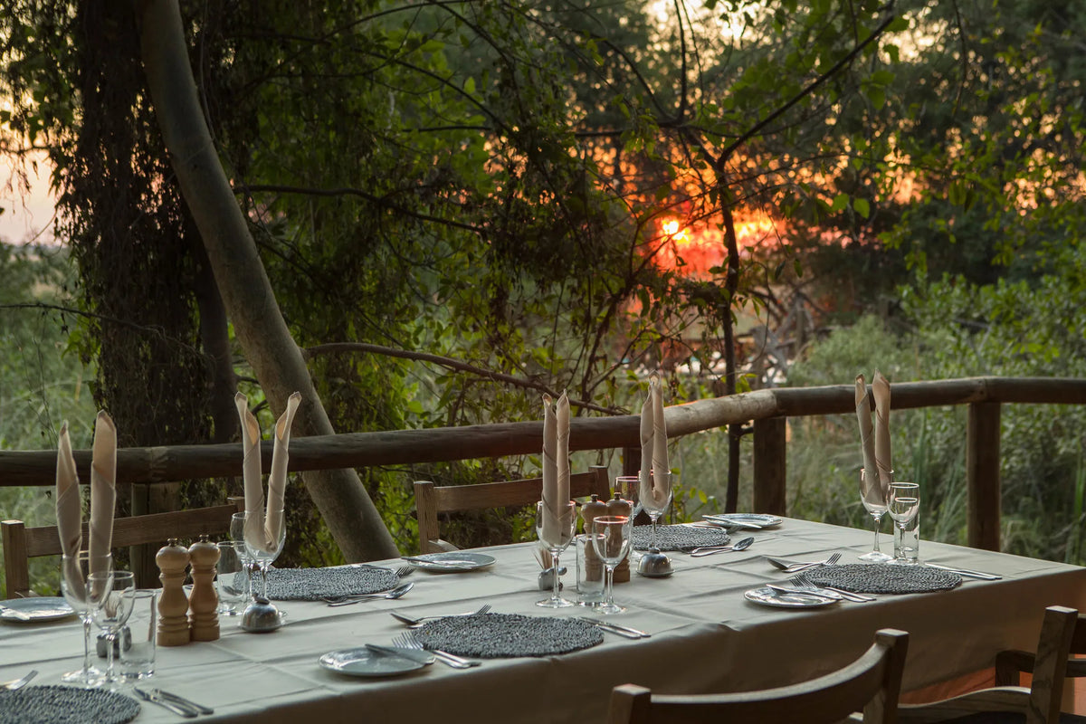Camp Moremi early morning sunrise from the deck at Camp Moremi, Moremi Game Reserve, Botswana.
