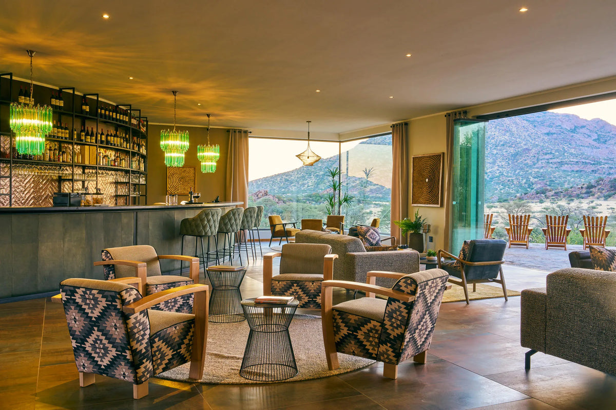 Lounge-and-Bar-at-Main-Area-Hohenstein-Lodge at Hohenstein Lodge, Erongo Mountains, Namibia.