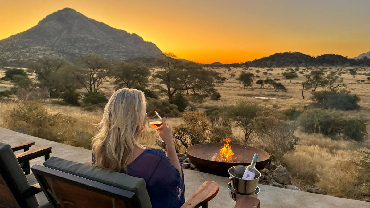 Sundowner-at-Fire-Hohenstein-Lodge at Hohenstein Lodge, Erongo Mountains, Namibia.