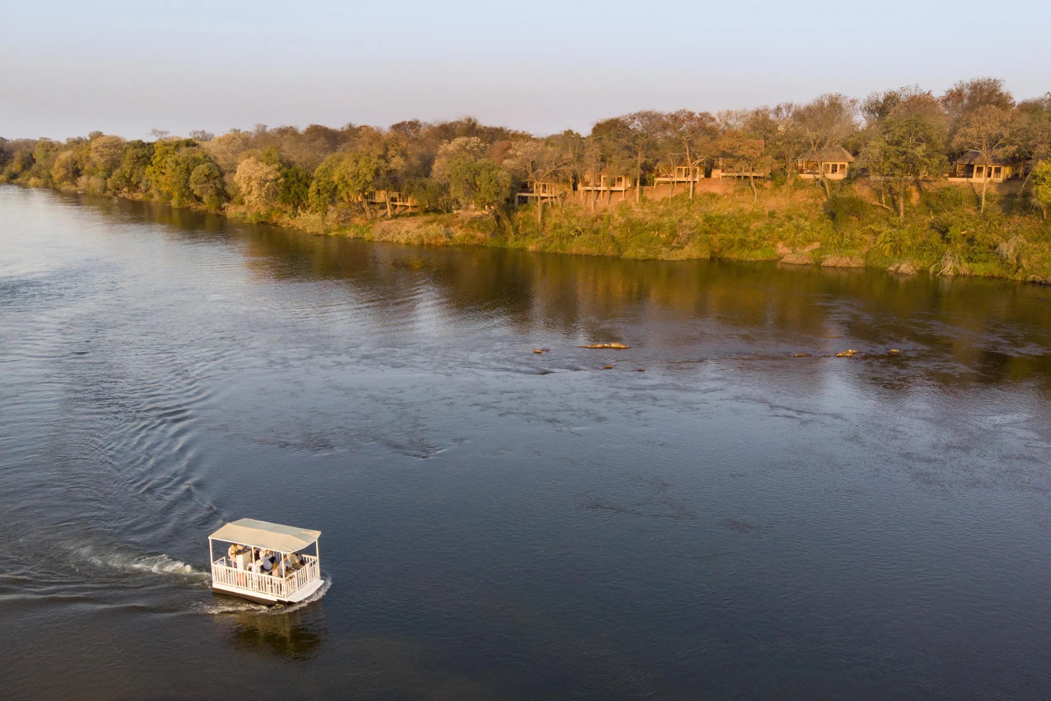 Lodge view from the Boat at Divava Okavango Resort & Spa, Divundu, Namibia.