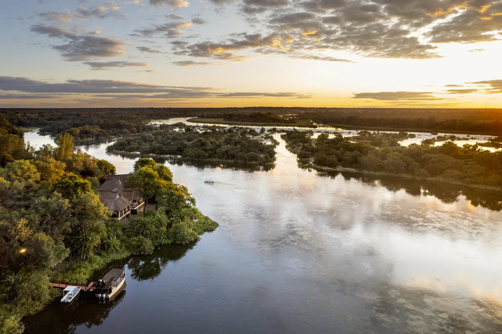The lodge main building at sunset at Divava Okavango Resort & Spa, Divundu, Namibia.