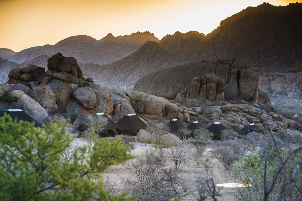 Thatched chalets and their setting at Ai Aiba Rock Painting Lodge, Erongo Mountains, Namibia.