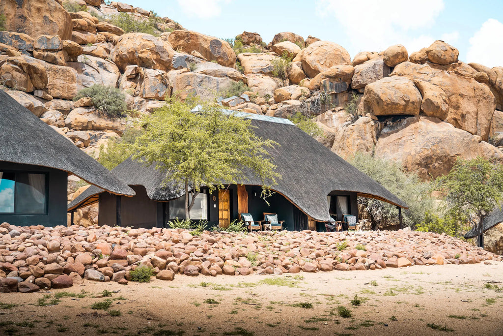 Thatched Chalets at Ai Aiba Rock Painting Lodge, Erongo Mountains, Namibia.