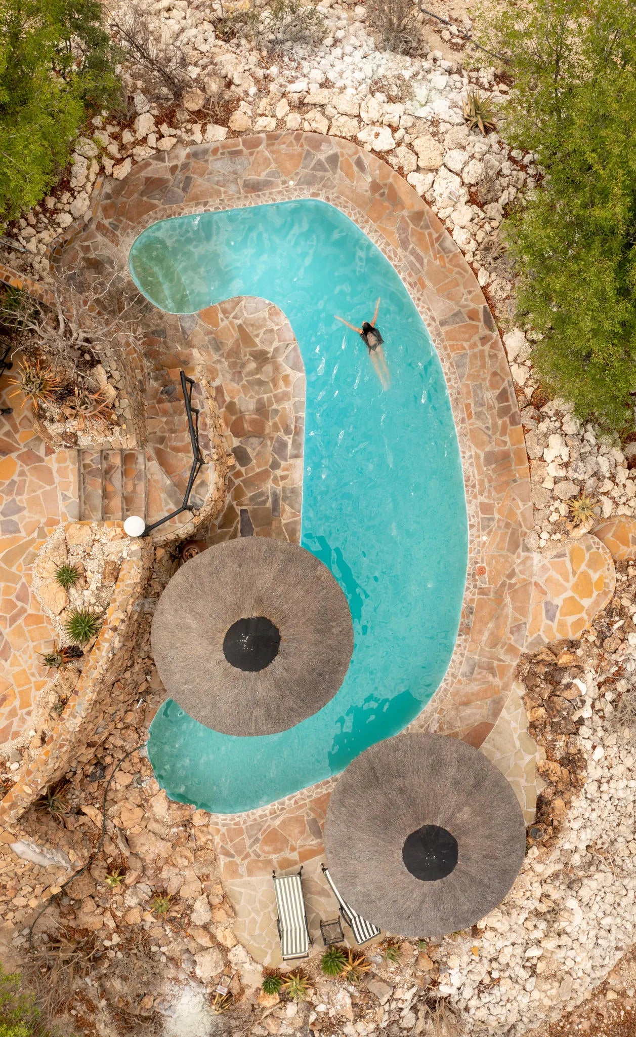 Sun-upper pool at Vingerklip Lodge, Outjo, Namibia.