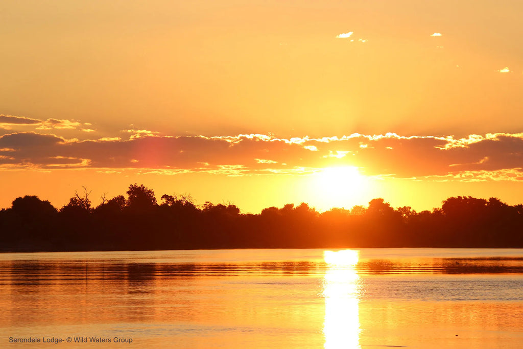 Sunset on the Chobe-Zambezi floodplain at Serondela Lodge, Chobe River Front Namibia, Namibia.