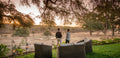 Take time to unwind overlooking Victoria Falls Private Game Reserve