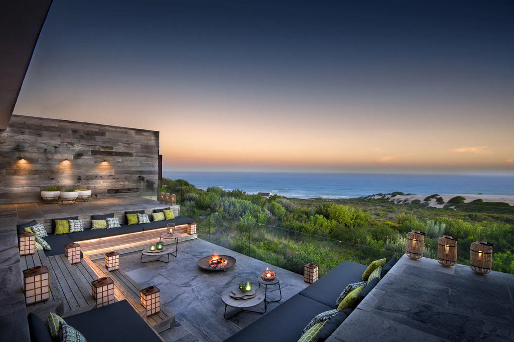 Morukuru Beach Lodge - firepit boma overlooking the ocean at Morukuru Beach Lodge, De Hoop Nature Reserve, South Africa.