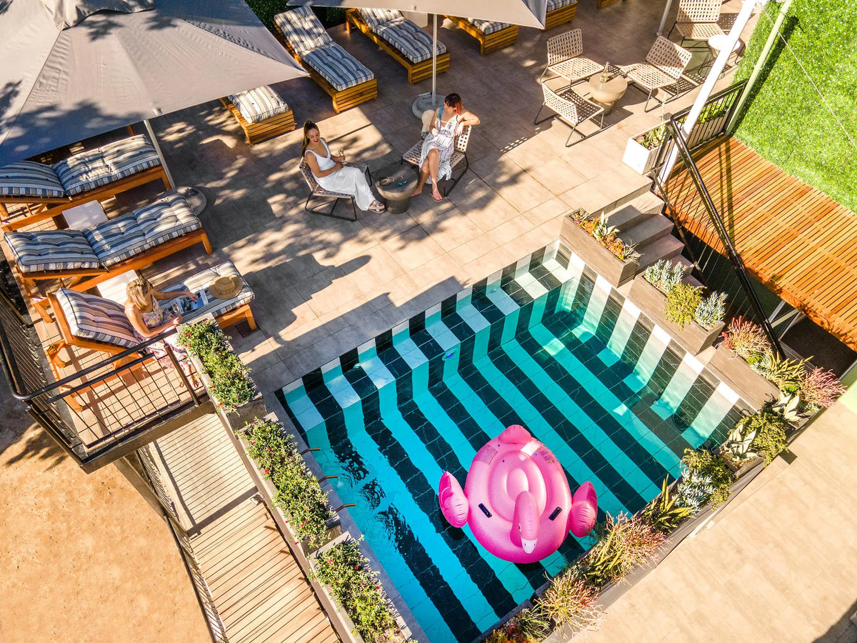 Pool deck, jacuzzi and sauna at Cloud 9 Boutique Hotel & Spa, Cape Town, South Africa.