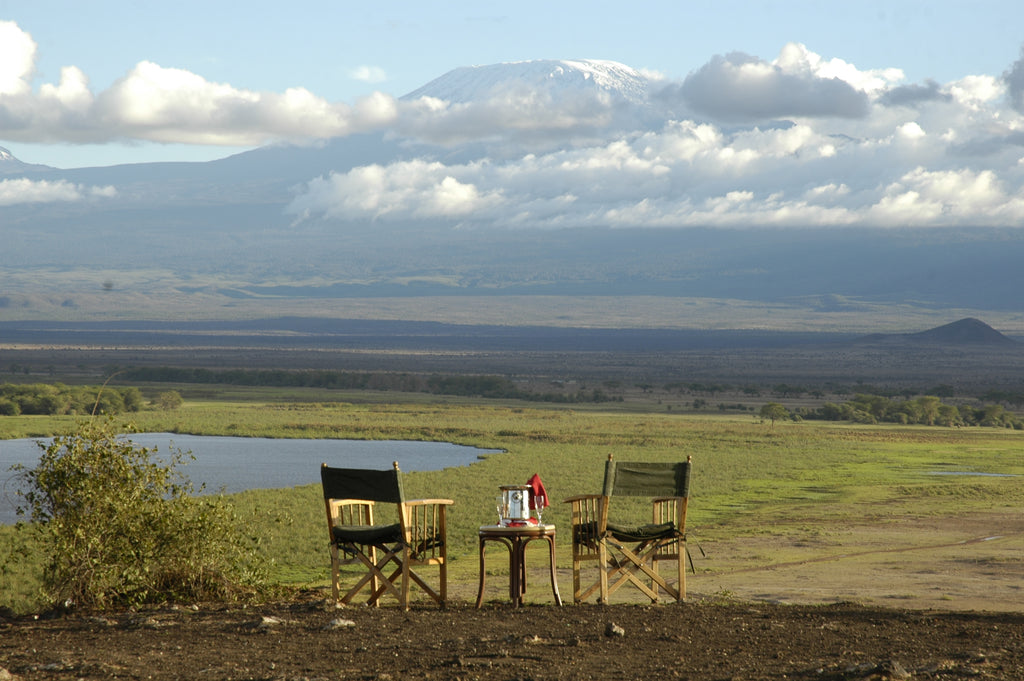 Sundowner on Observation Hill Overlooking Mt. Kilimanjaro