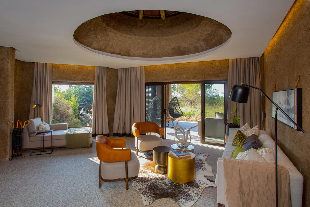 Amber Villa Lounge Area at Sabi Sabi Earth Lodge, Sabi Sand Nature Reserve, South Africa.