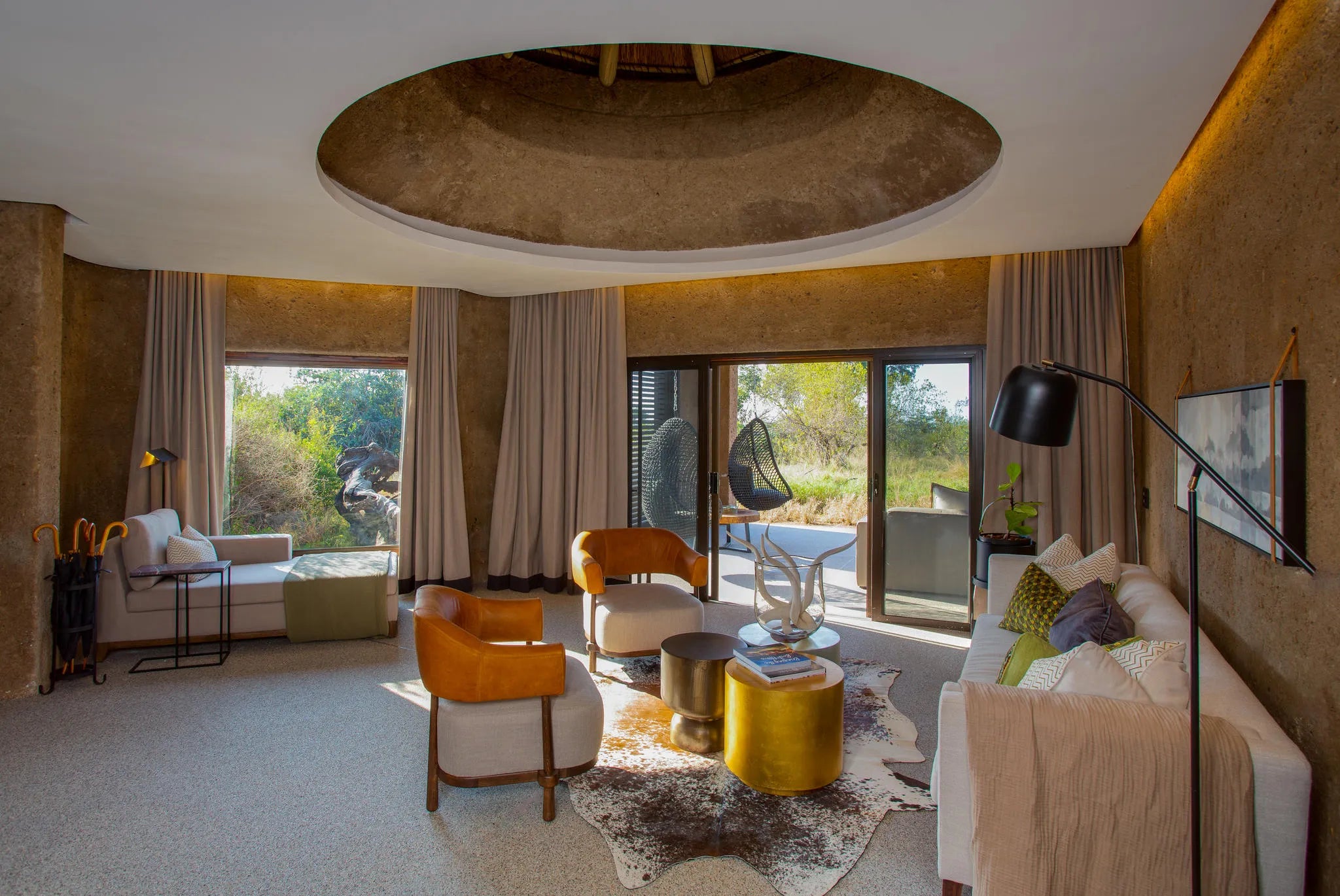 Amber Villa Lounge Area at Sabi Sabi Earth Lodge, Sabi Sand Nature Reserve, South Africa.