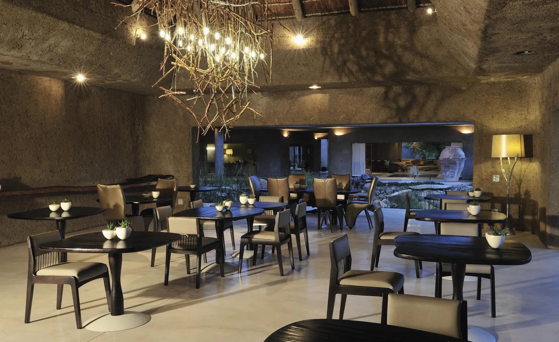 Dining area at Sabi Sabi Earth Lodge, Sabi Sand Nature Reserve, South Africa.