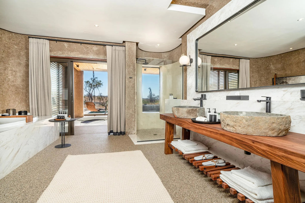 Luxury Suite En Suite Bathroom at Sabi Sabi Earth Lodge, Sabi Sand Nature Reserve, South Africa.