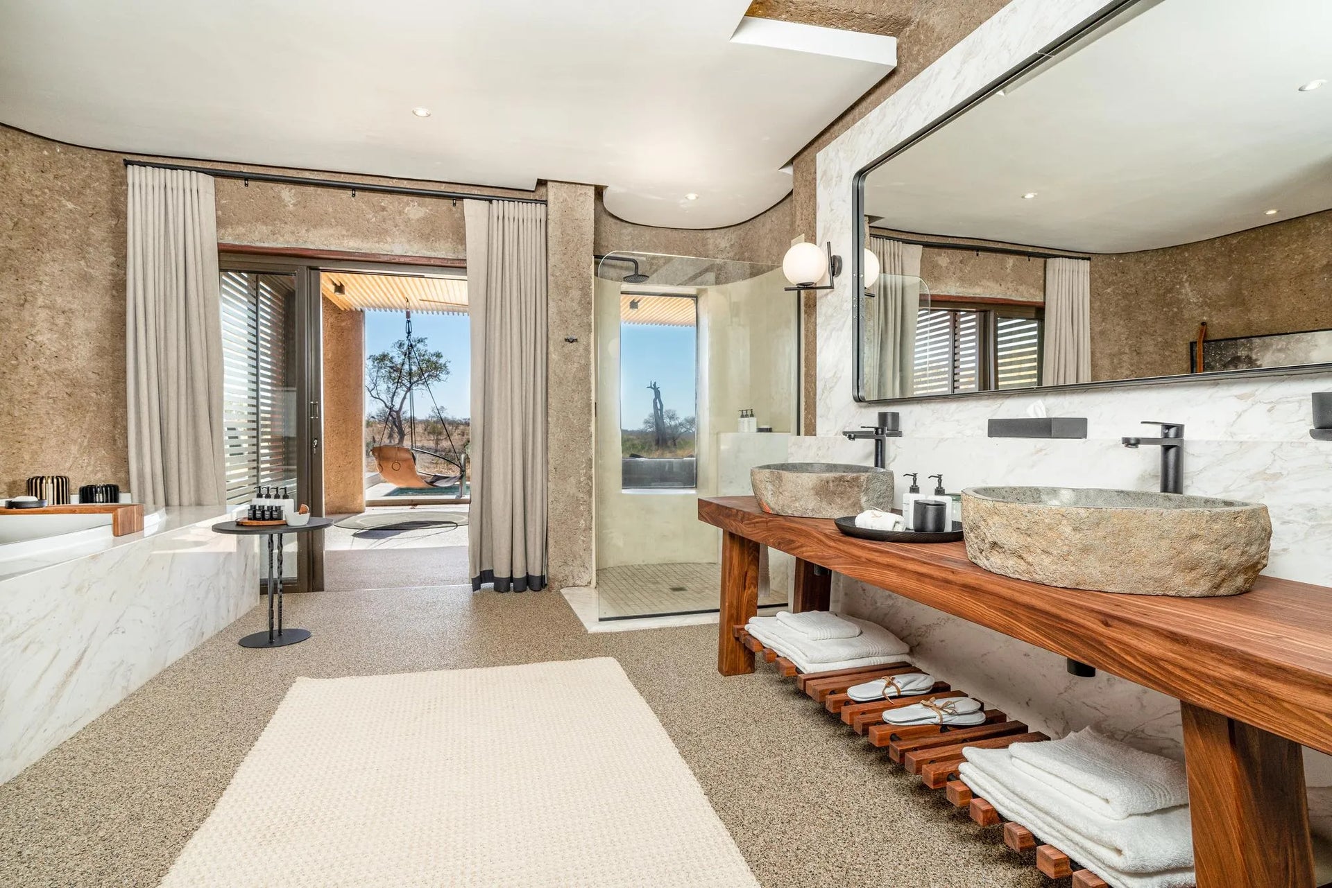 Luxury Suite En Suite Bathroom at Sabi Sabi Earth Lodge, Sabi Sand Nature Reserve, South Africa.