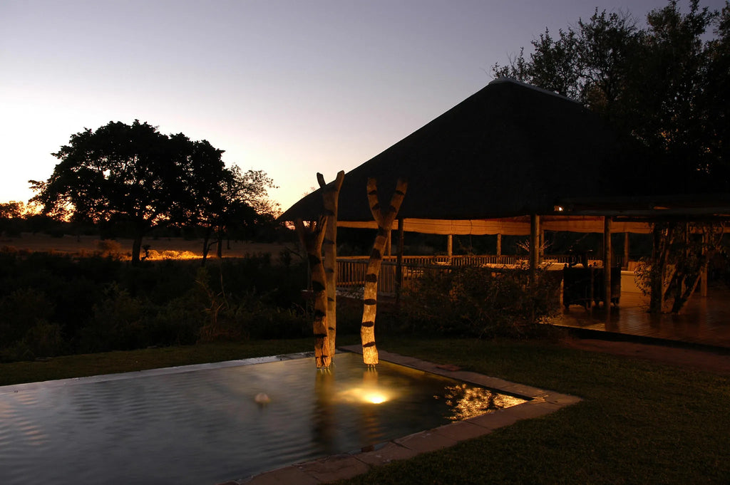 Bush Lodge View at night at Sabi Sabi Bush Lodge, Sabi Sand Nature Reserve, South Africa.