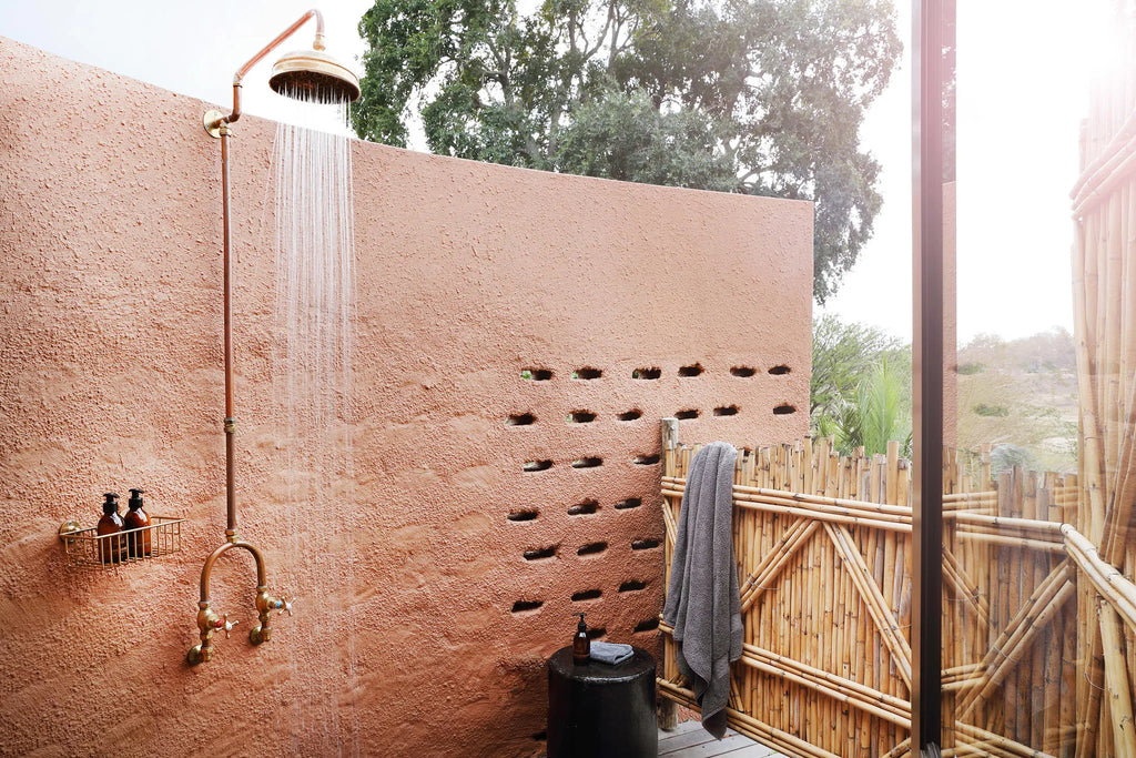 MalaMala Camp Suite outdoor shower at MalaMala Camp, MalaMala Game Reserve, South Africa.