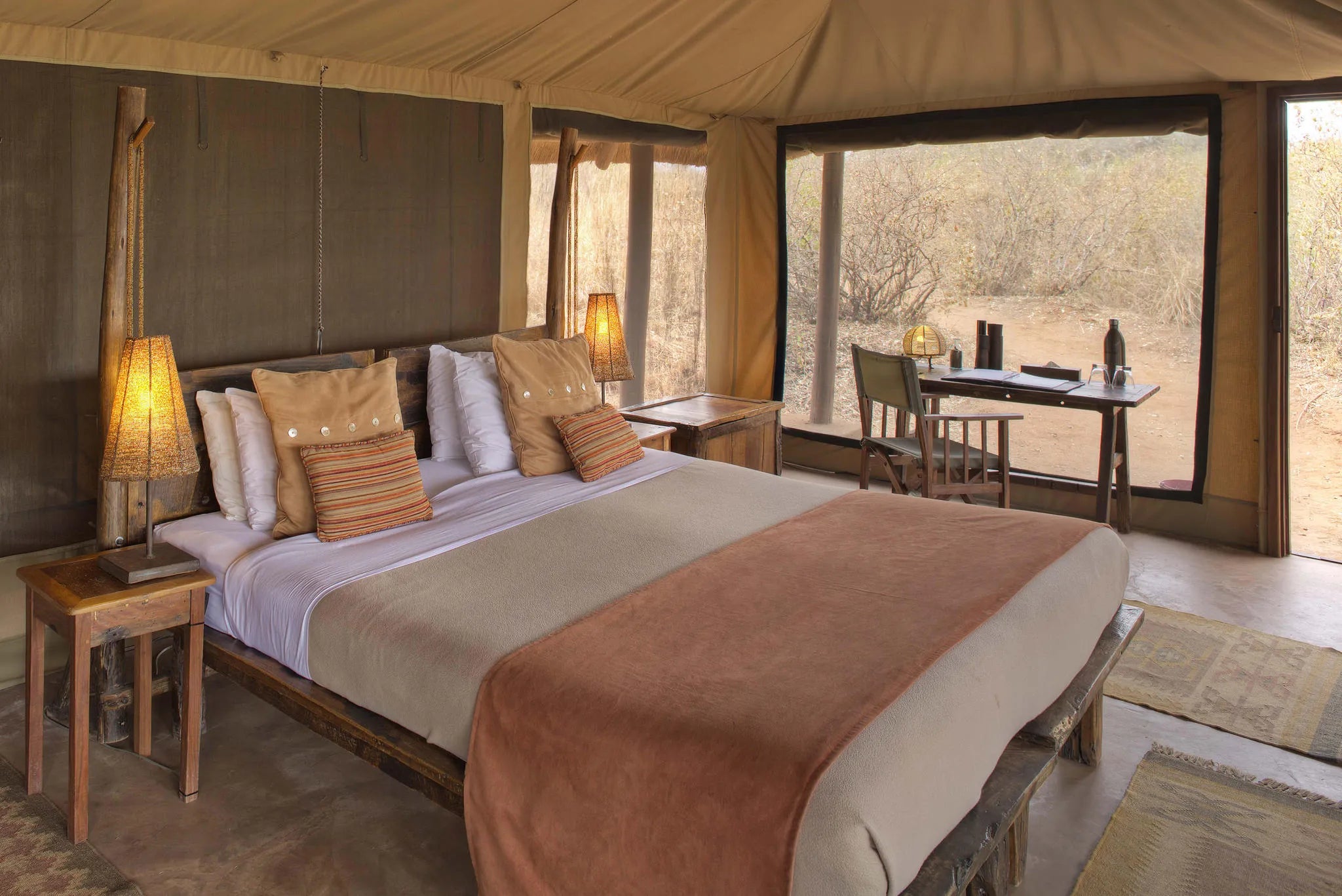 Oliver's Camp - Guest tent bedroom at Oliver's Camp, Tarangire National Park, Tanzania.