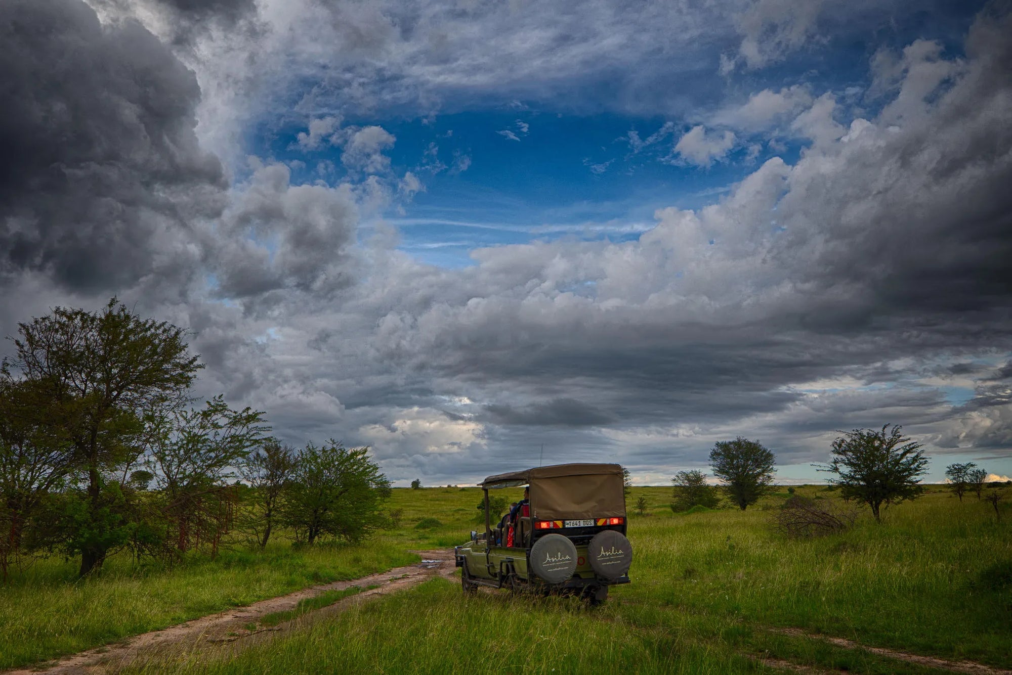 Sayari - guests on games drive at Sayari, Northern Serengeti, Tanzania.