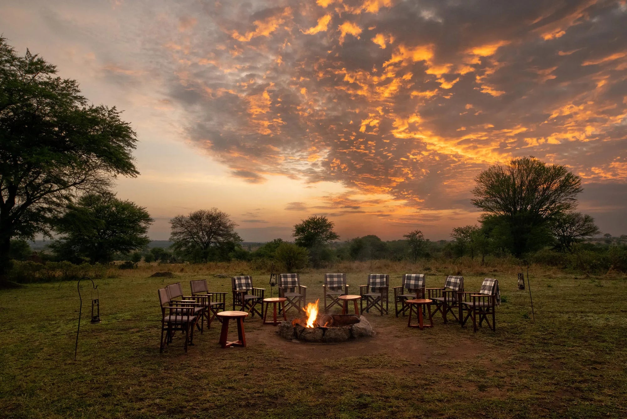 Sayari - camp fire set up ready for the evening stories of the days sightings at Sayari, Northern Serengeti, Tanzania.