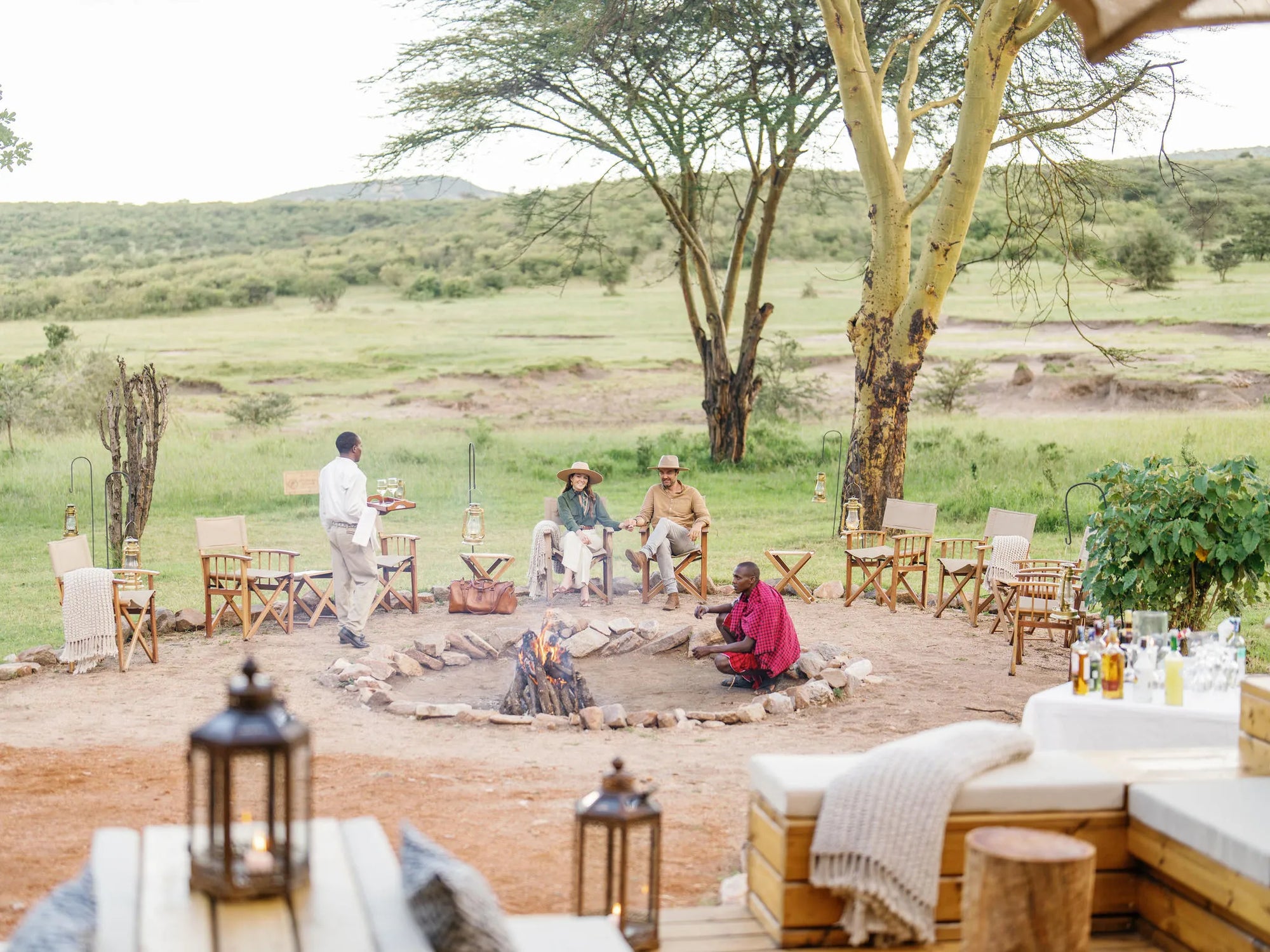 camp fire cocktails at Mara Bushtops Camp, Masai Mara, Kenya.