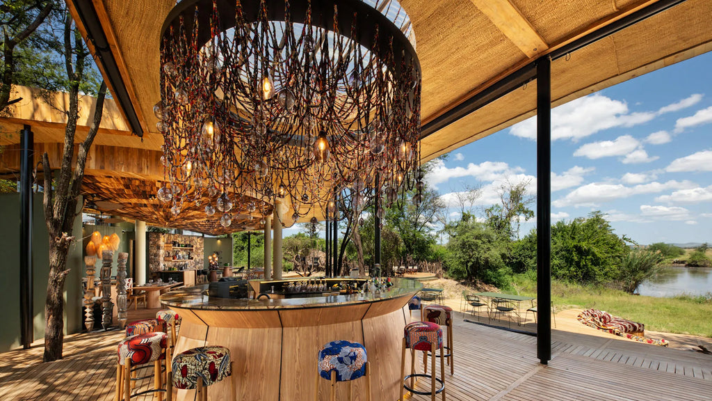 Tanzania-Grumeti-Serengeti-River-Lodge-Guest-Area-bar-with-river-view at andBeyond Grumeti Serengeti River Lodge, Serenget...