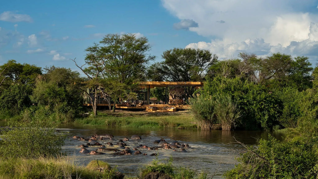 Tanzania-Grumeti-Serengeti-River-Lodge-Guest-Area-exterior-with-hippo-pod_2 at andBeyond Grumeti Serengeti River Lodge, Se...