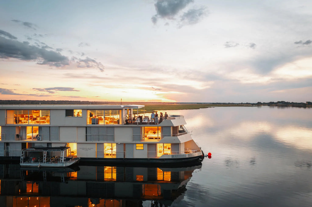 Zambezi Queen at Dusk at Zambezi Queen by Mantis, Chobe River Front Namibia, Namibia.