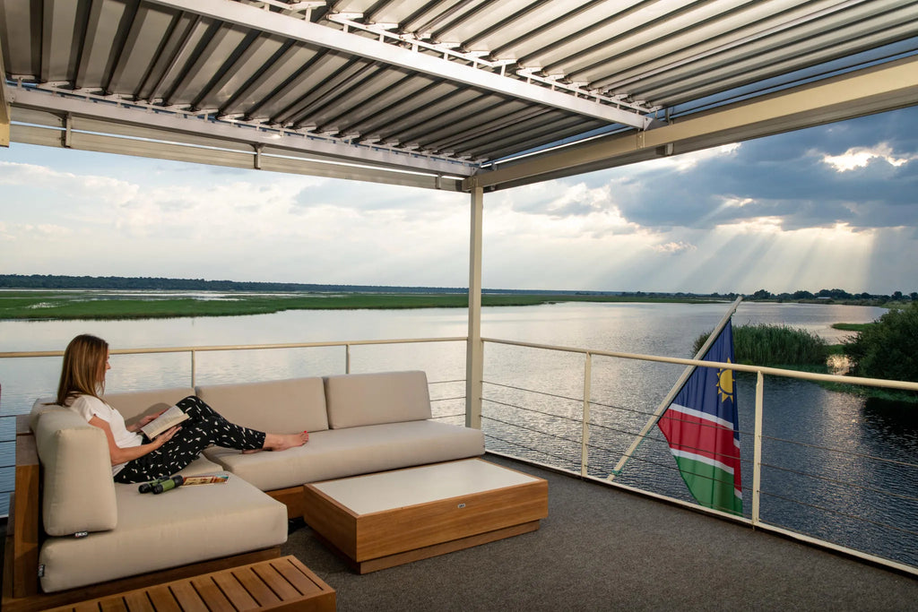 Stern Lounge Bar at Zambezi Queen by Mantis, Chobe River Front Namibia, Namibia.