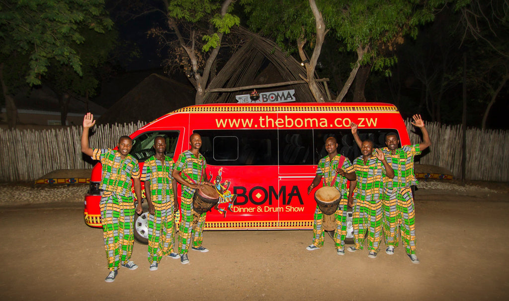 The Boma bus and the drummers at The Boma - Dinner & Drum Show