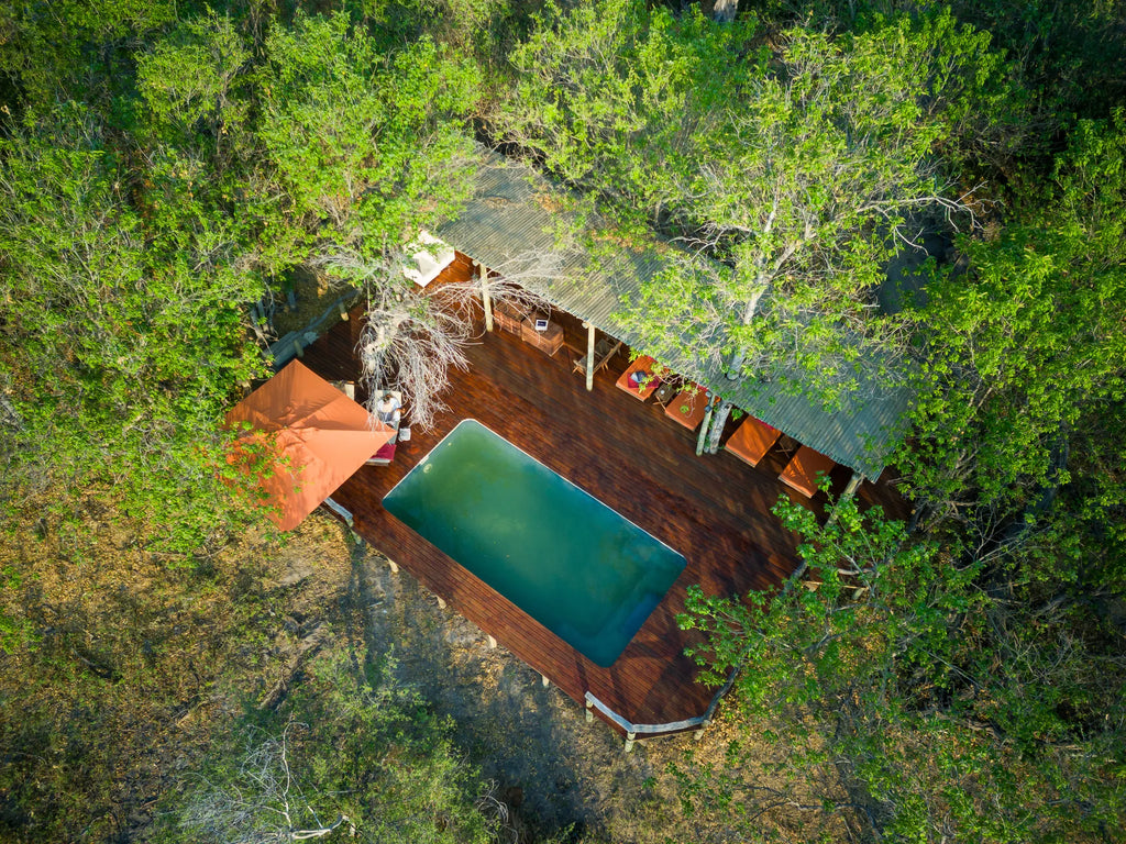 Amber River Camp Pool Area at Amber River Camp, Okavango Delta, Botswana.