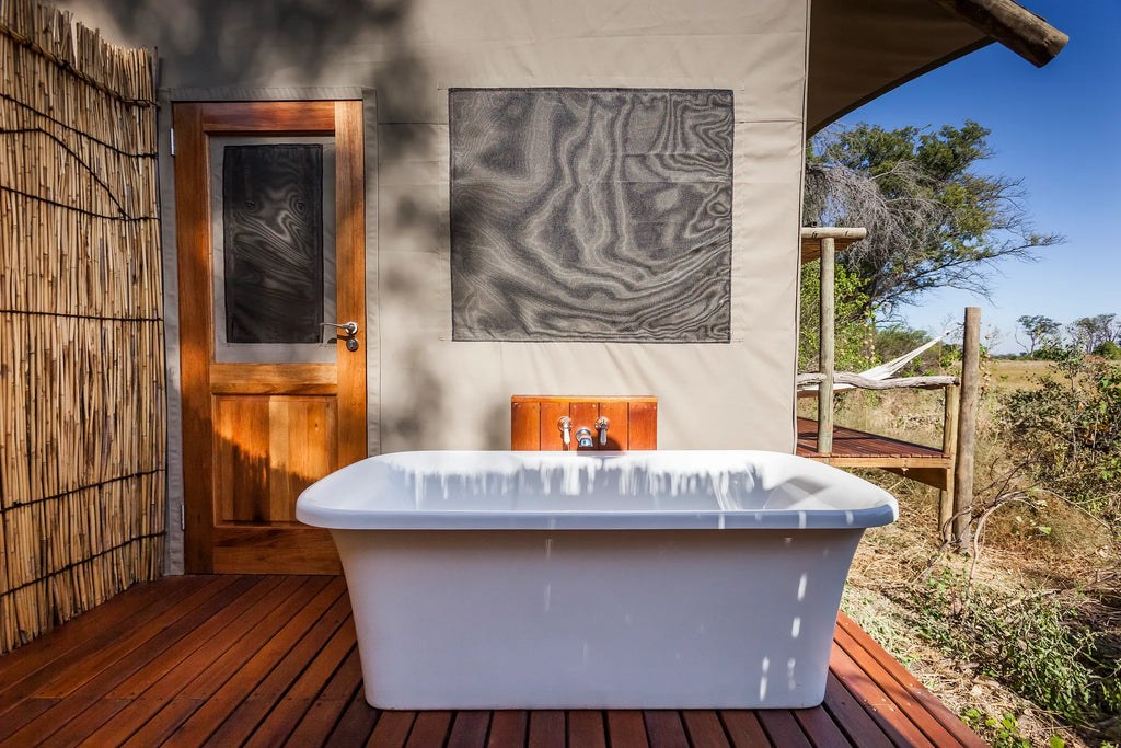 Outside Bath - Amber River Camp at Amber River Camp, Okavango Delta, Botswana.