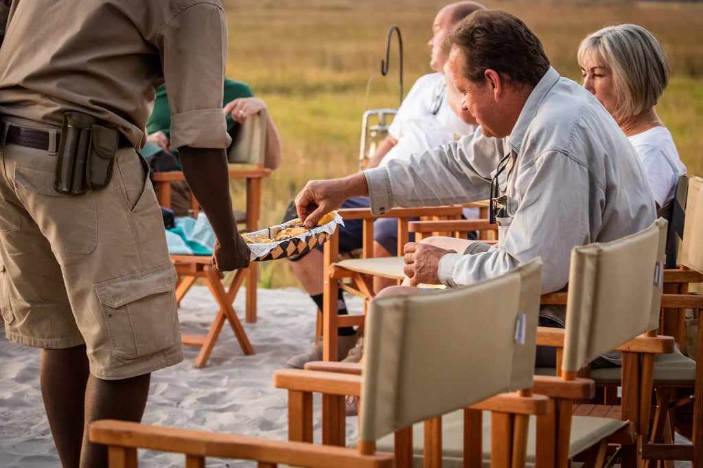 Boma evening at Amber River Camp, Okavango Delta, Botswana.