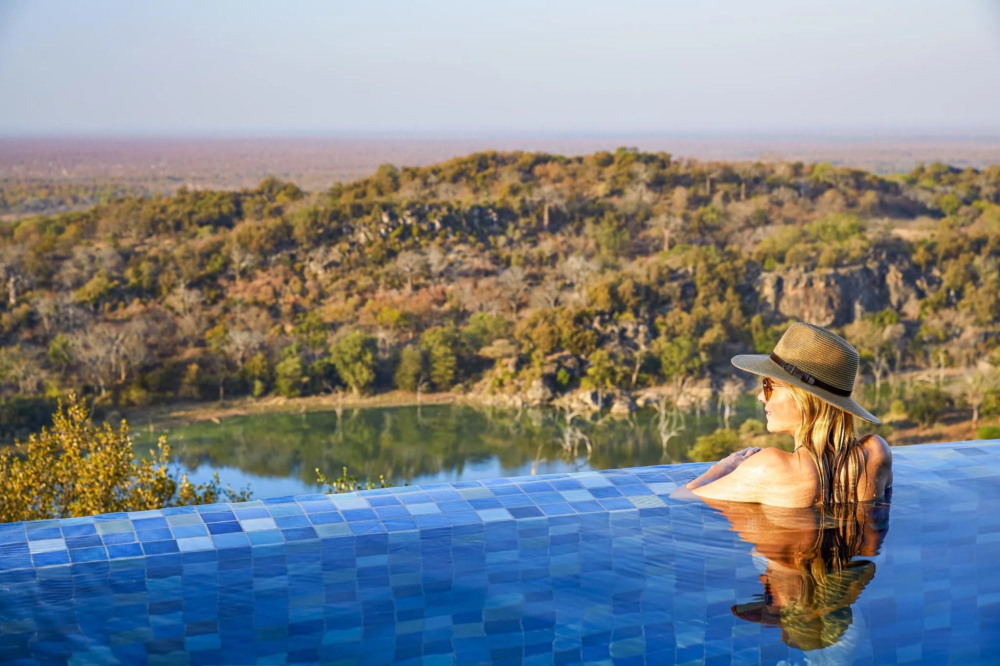 Singita Malilangwe House - Villa pool with a view at Singita Malilangwe House, Malilangwe Wildlife Reserve, Zimbabwe.