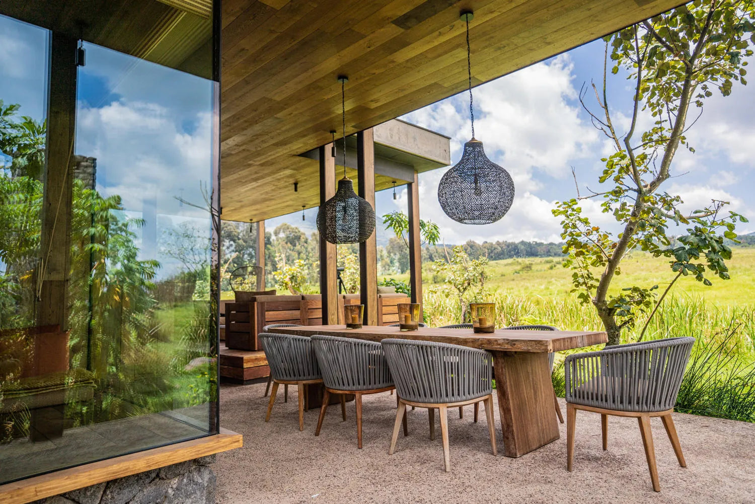 Singita Volcanoes National Park - Outdoor Dining at Singita Kataza House, Volcanoes National Park, Rwanda.