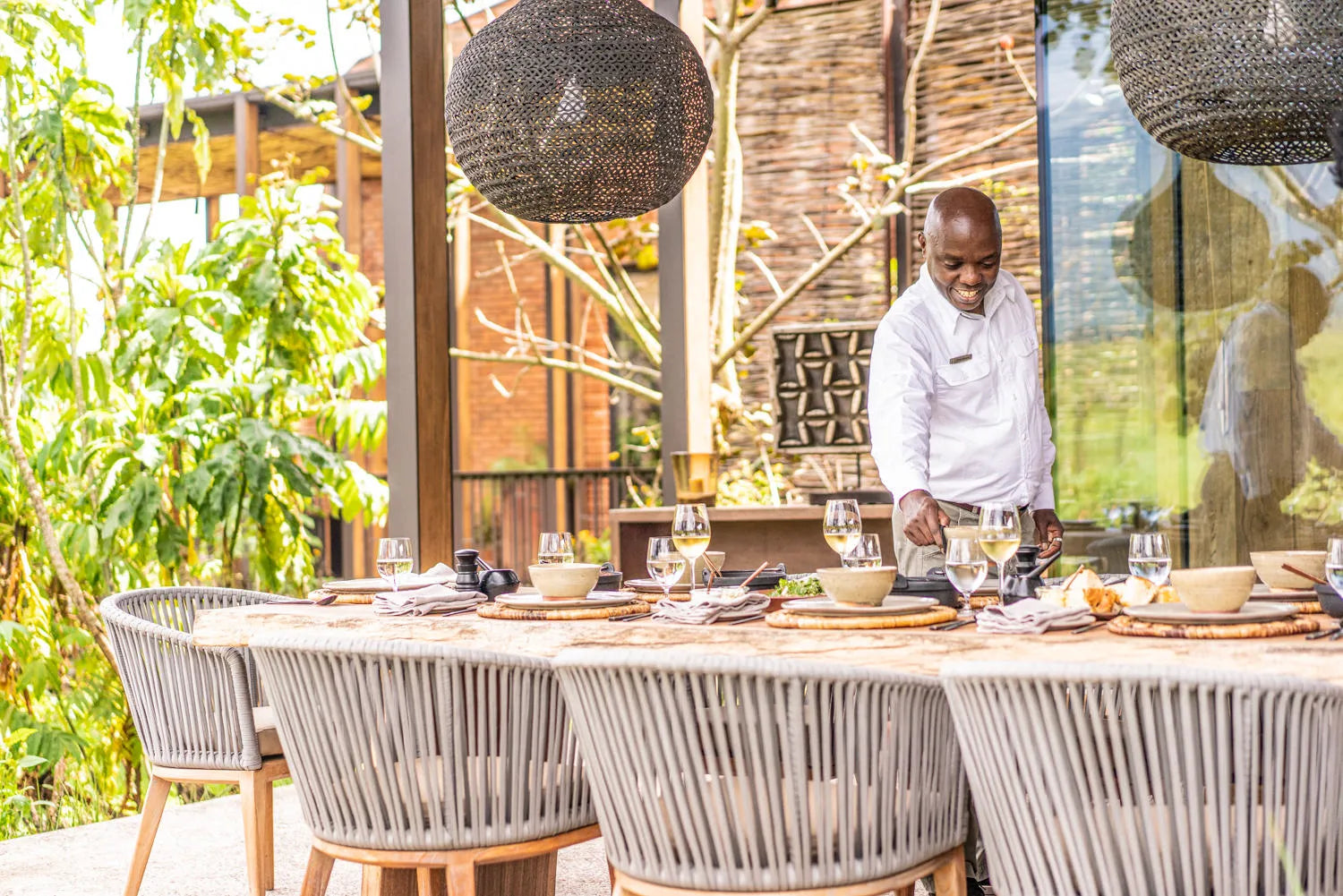 Singita Volcanoes National Park - Outdoor dining at Singita Kataza House, Volcanoes National Park, Rwanda.