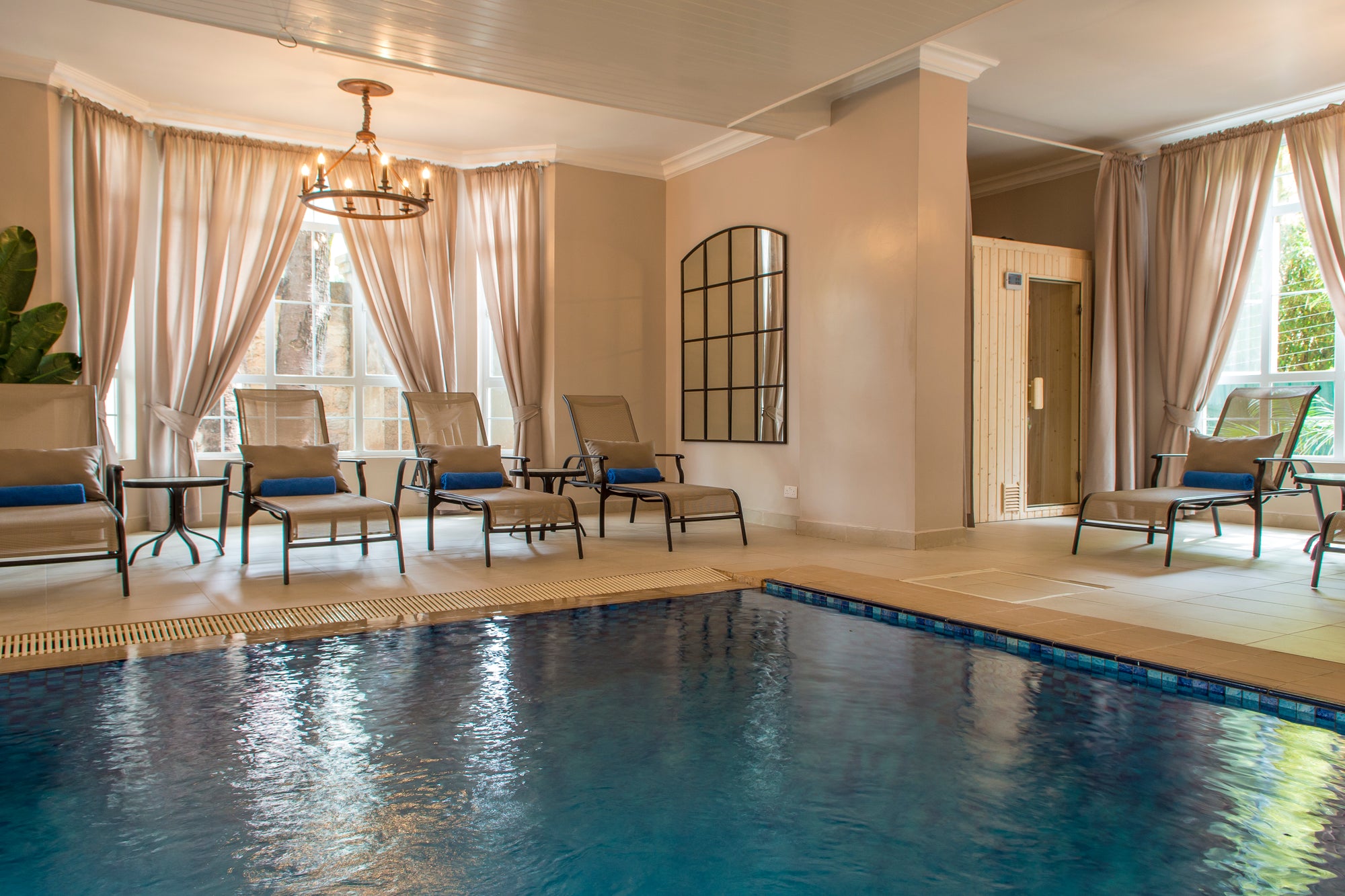 Palacina indoor heated pool deck showing sauna at the corner