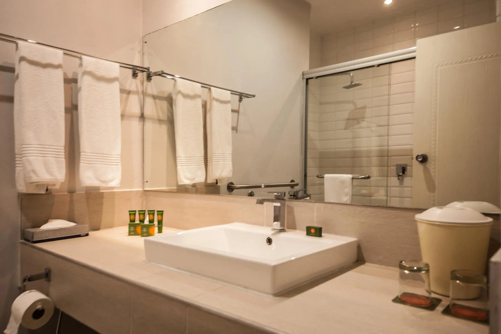 Bathrooms in River rooms at The Chobe Safari Lodge, Kasane, Botswana.