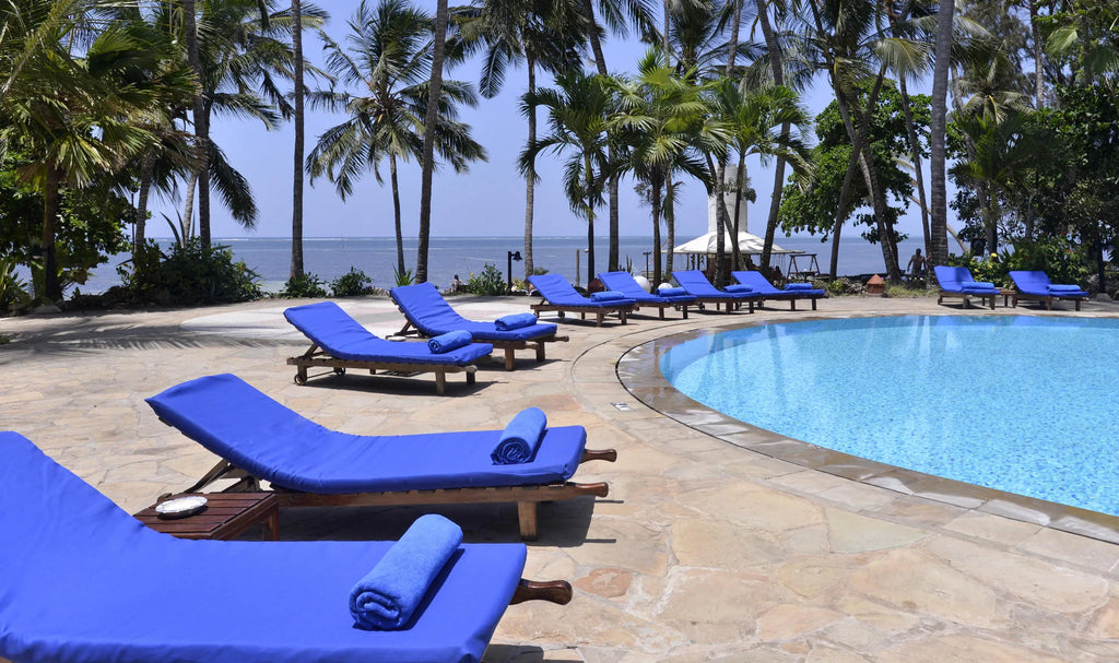 Relaxing at Safari Pool at Severin Sea Lodge, Bamburi, Kenya.