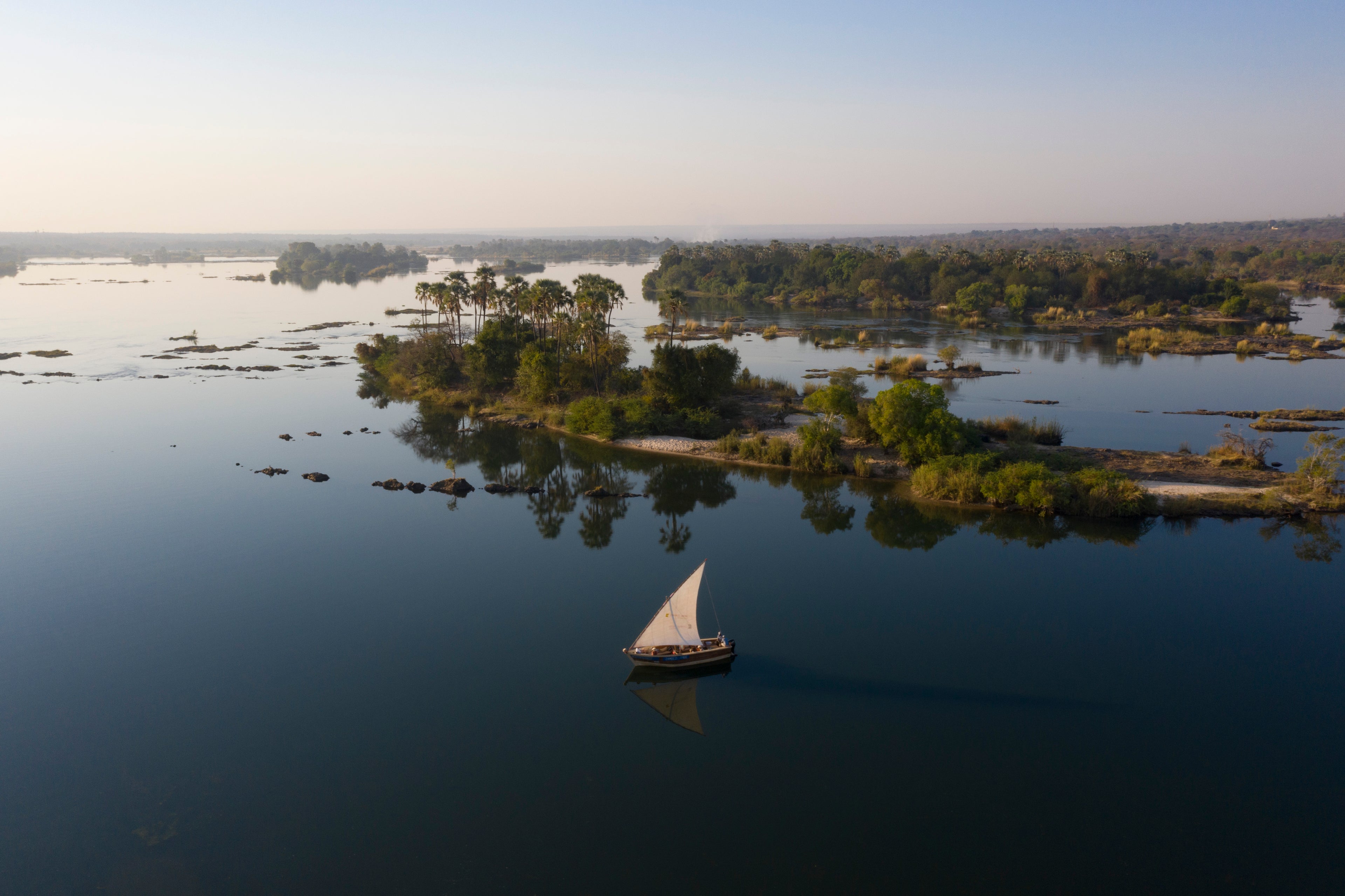 sailing past the islands in the river