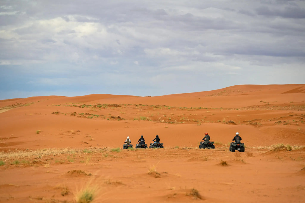 Quad Biking at Kwessi Dunes, NamibRand Nature Reserve, Namibia.