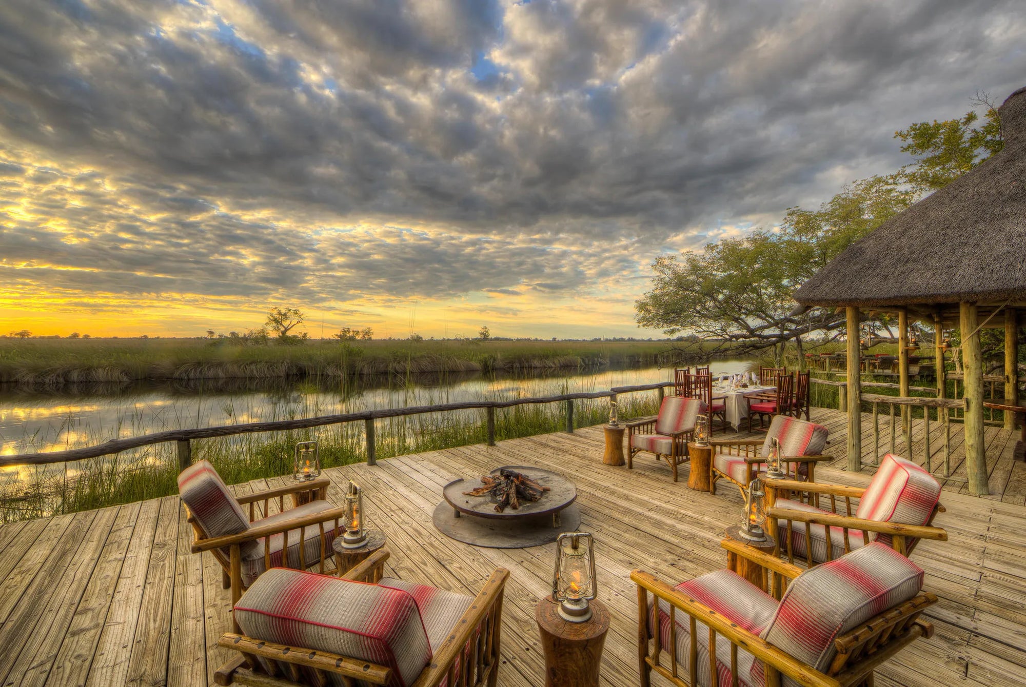 Camp Xakanaxa Dining Deck Fire Place at Camp Xakanaxa, Moremi Game Reserve, Botswana.