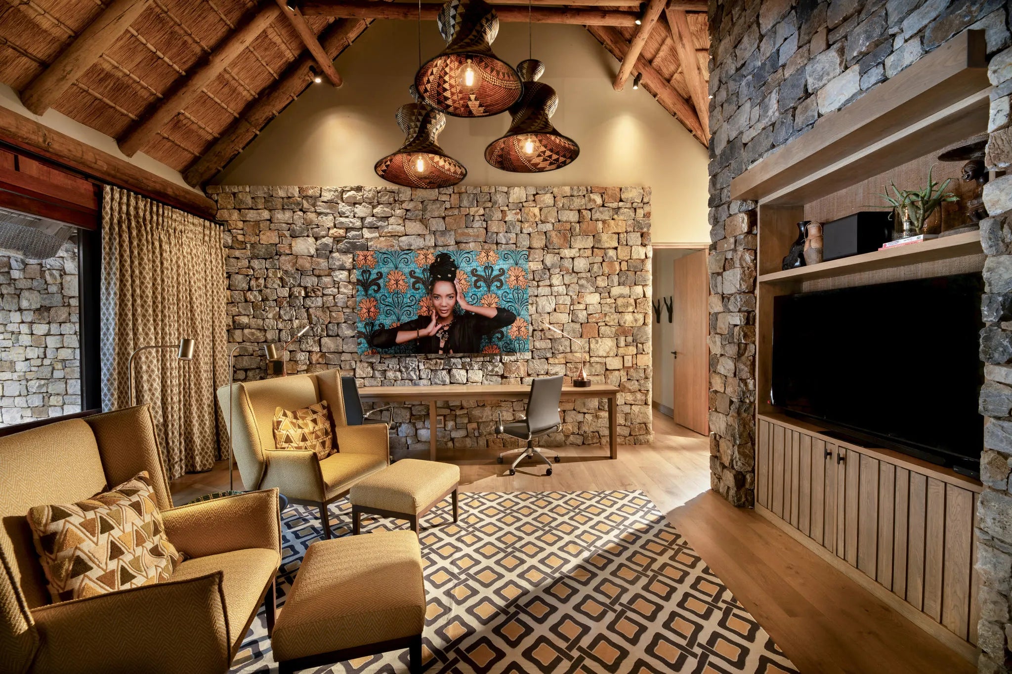 Morukuru Owner's House - TV room and library at Morukuru Owners House, Madikwe Game Reserve, South Africa.