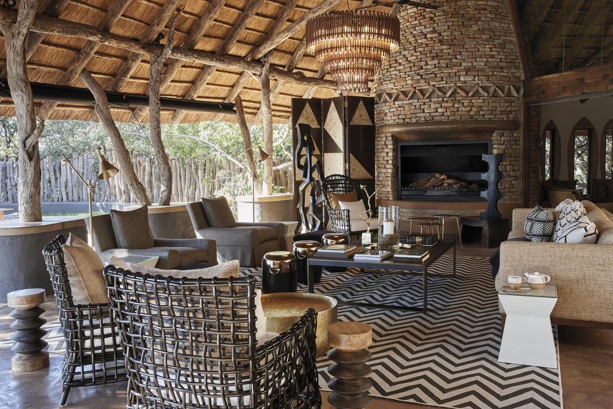 Singita Pamushana Lodge Lounge & Fireplace at Singita Pamushana Lodge, Malilangwe Wildlife Reserve, Zimbabwe.
