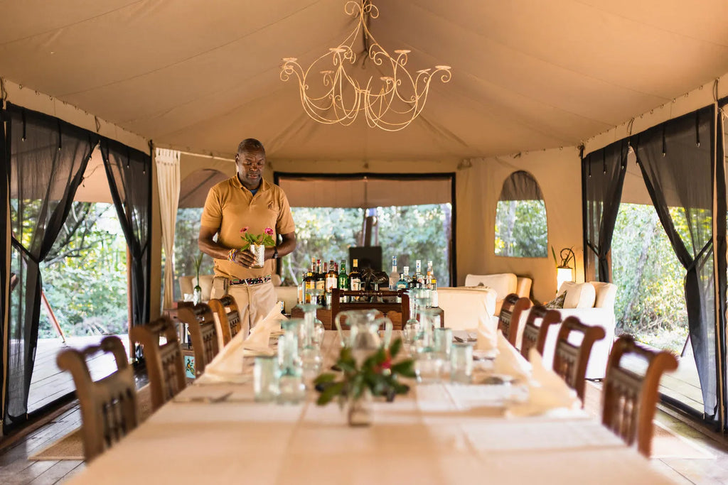 Mess Interior - Dinner setup at Ngare Serian, Mara North Conservancy, Kenya.