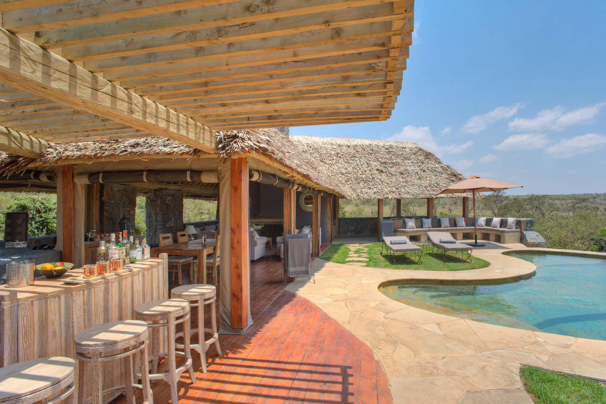 Naboisho Camp - Bar and pool area at Naboisho, Mara Naboisho Conservancy, Kenya.