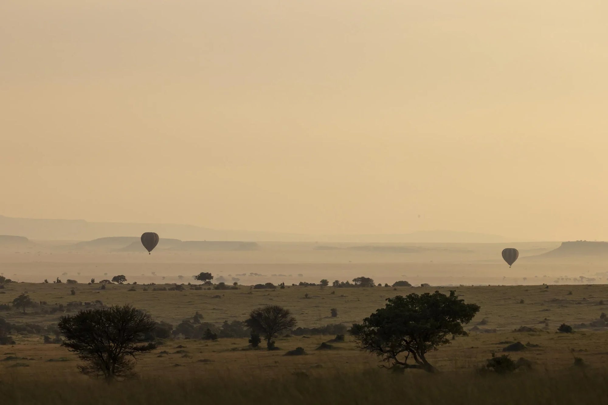 Olakira - Horizon with HotAir Balloon at Olakira Migration Camp - North (Jun - Oct), Northern Serengeti, Tanzania.