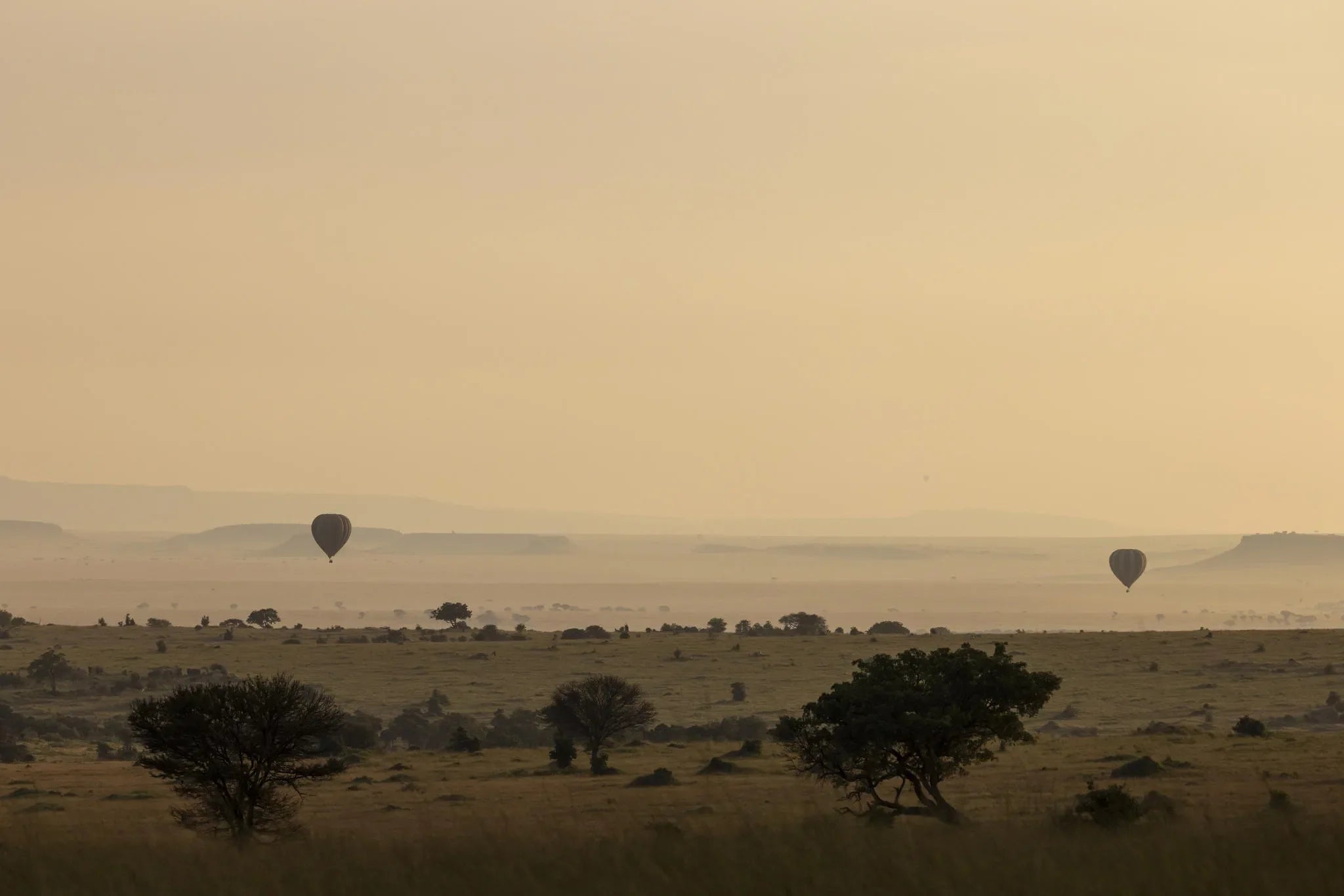Olakira - Horizon with HotAir Balloon at Olakira Migration Camp - North (Jun - Oct), Northern Serengeti, Tanzania.