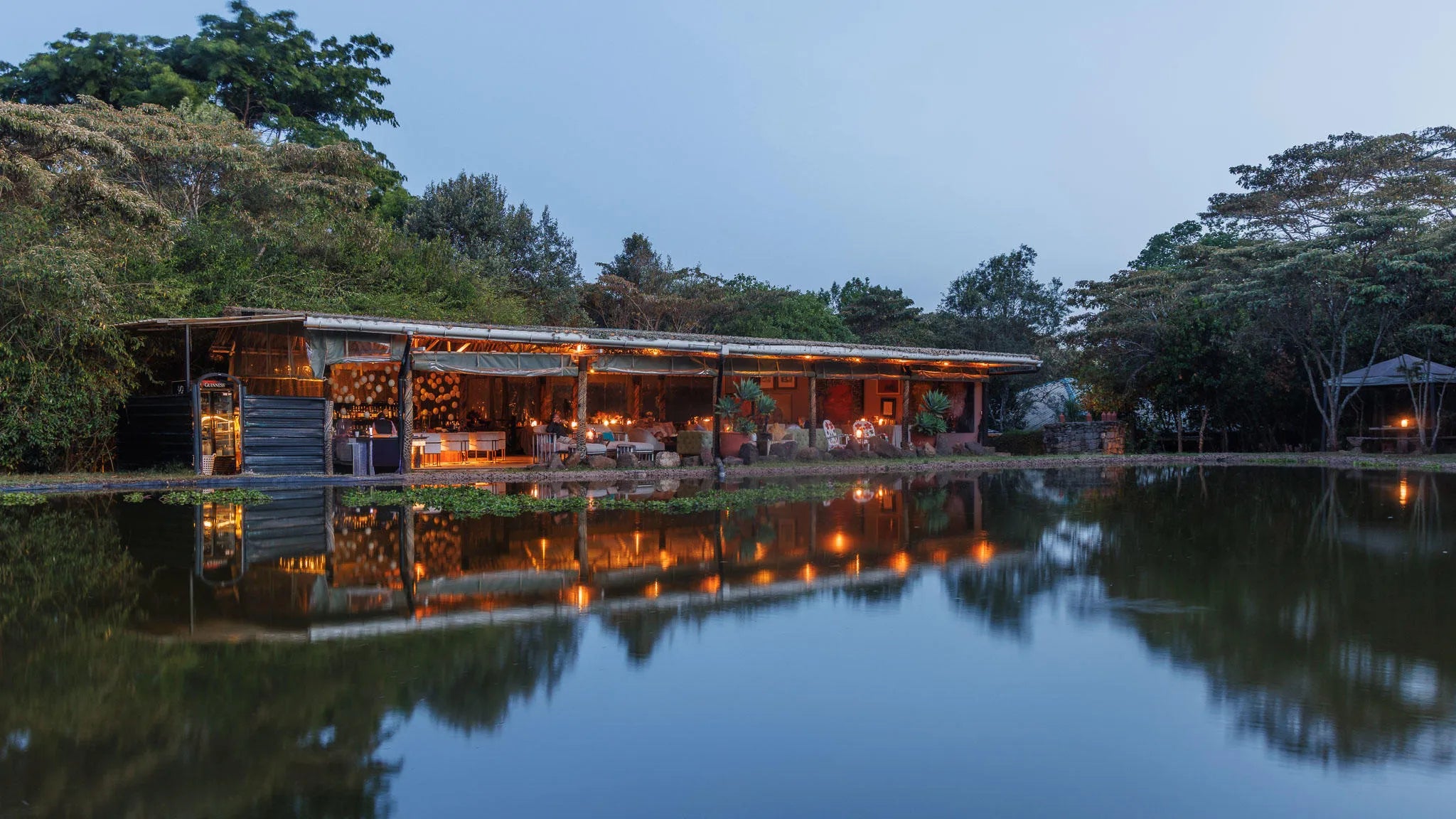 The Deck Restaurant - Evening view at Hemingways Eden, Nairobi, Kenya.