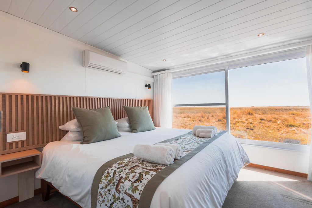 Chobe Princess Cabin king sized bed at Chobe Princess By Mantis, Chobe River Front Namibia, Namibia.