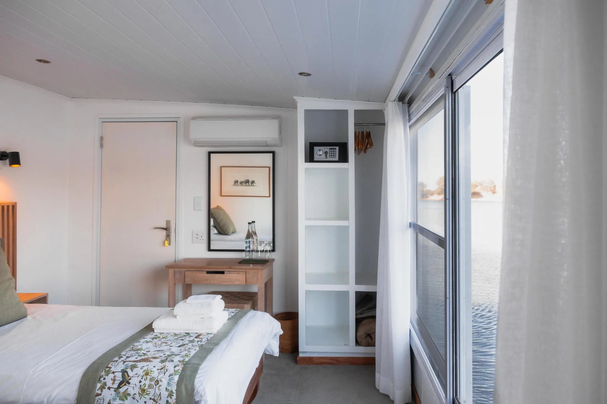 Chobe Princess Cabin wardrobe and dresser at Chobe Princess By Mantis, Chobe River Front Namibia, Namibia.